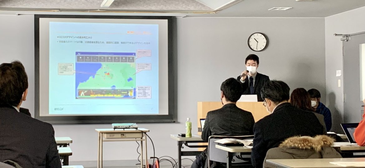 A man presenting at a meeting.